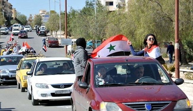 Photo of Syrians launch pro-government rallies in different cities