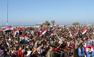 Photo of Photos- Syrians launch pro-government rallies in different cities