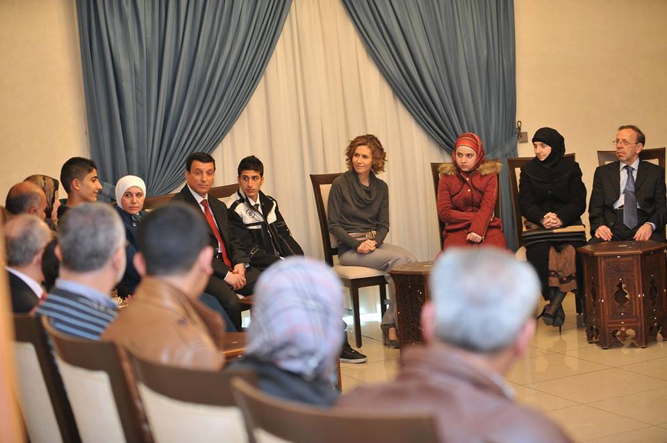 Photo of Mrs. Asma al-Assad honors the eminent students of Aleppo