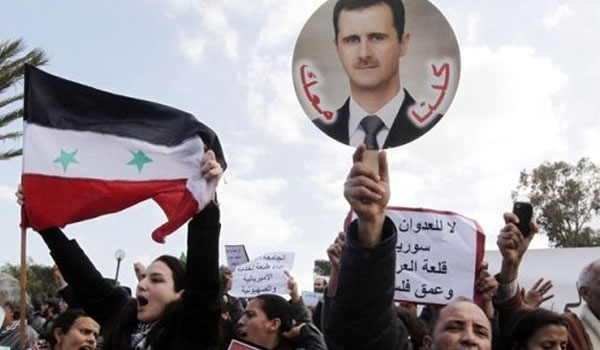 Photo of Syrians Hold Pro-Assad Rally in Tunis
