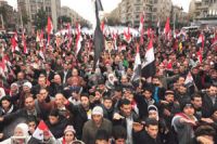 Photo of Syrians stage pro-government rallies