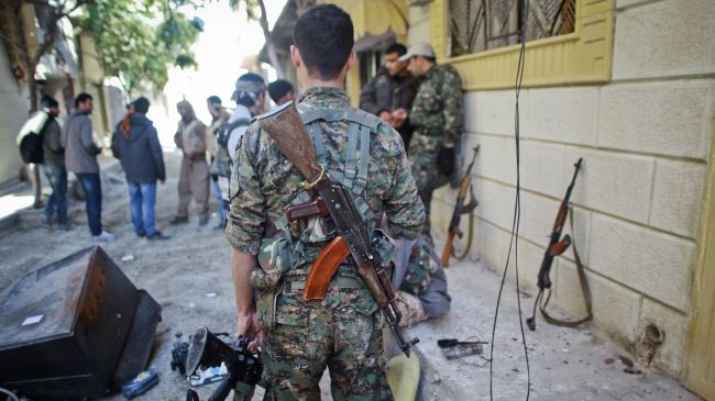 Photo of ISIL Takfiri militants shell refugee camp in Kobani