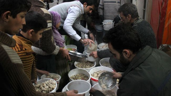 Photo of Humanitarian aid reaches Damascus neighborhood