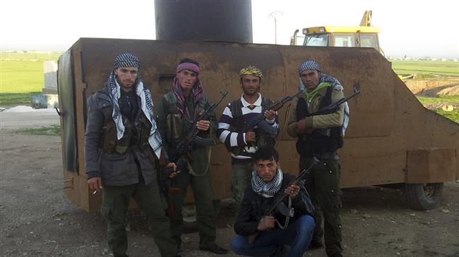 Photo of Kurdish fighters kill Inhuman Saudi ISIL commander during battle for Kobani in Syria