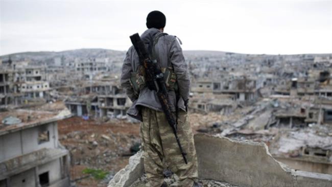 Photo of ISIL militants re-enter Syrian town of Kobani