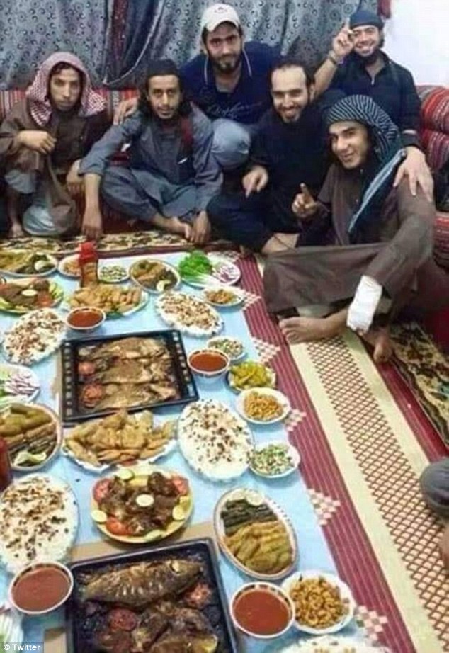 Photo of ISIS Terrorists Celebrate while People Starve