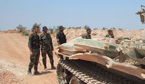 Photo of Syrian Troops Take Back Village from Militants in Fuaa Outskirts