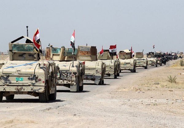 Photo of Iraqi Government Forces Take Position near Al-Shuhada