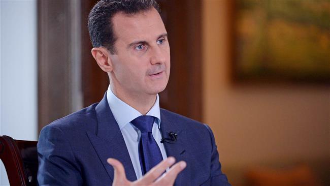 Photo of Assad hopes history will remember him as savior