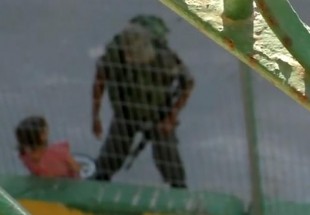 Photo of Rabid dog Israeli troops bully 8-year-old Palestinian girl, confiscate bike