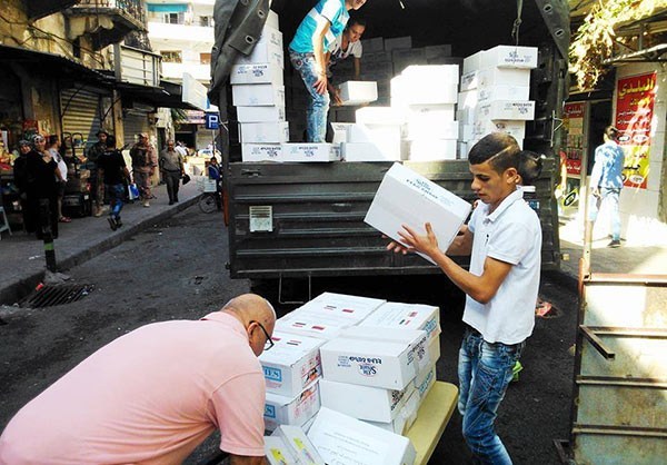 Photo of 40 Tons of Humanitarian Aid Distributed among People in Lattakia