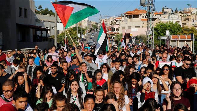 Photo of Palestinians living in Israel mark 16th anniversary of Second Intifada