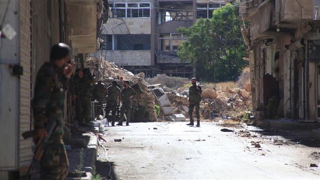 Photo of Syrian army soldiers, allies recapture more districts in Aleppo