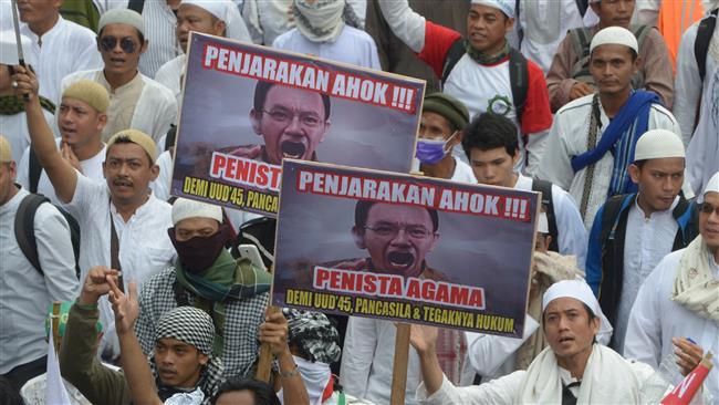 Photo of Police names Jakarta governor suspect in blasphemy case