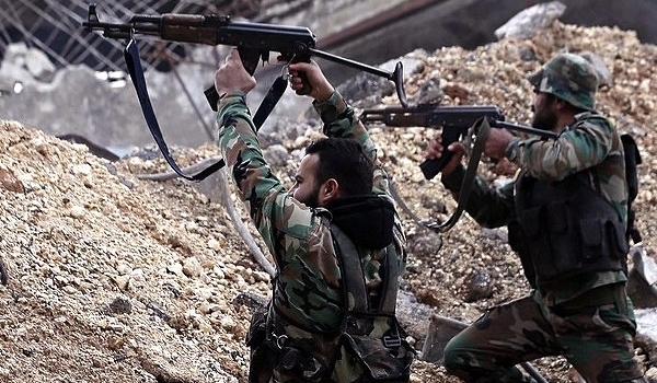 Photo of Syrian Army Soldiers Advance against Nusra Terrorists in Northwestern Damascus