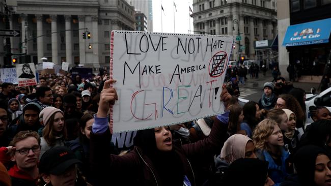 Photo of New York City students walk out of class for Trump protest