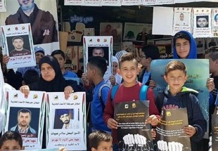 Photo of Palestinian protesters voice solidarity with hunger striking inmates