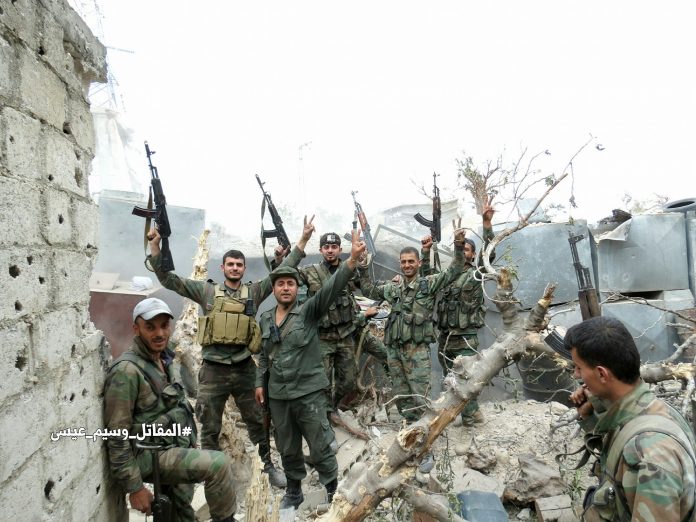 Photo of Syrian Army troops celebrate vital advance in east Damascus