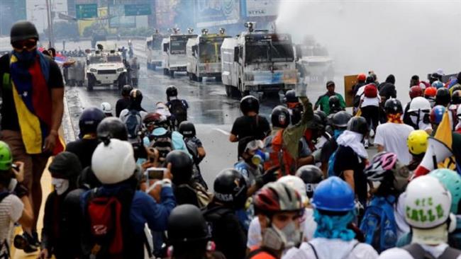 Photo of Clashes erupt between Venezuela police, foreign sponsored protesters in Caracas