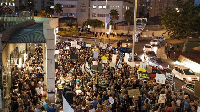 Photo of Israelis protest against PM embroiled in graft probes
