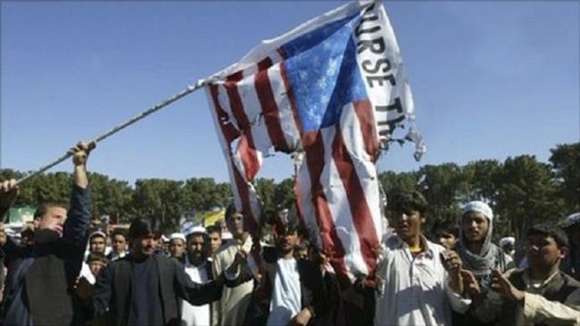 Photo of Afghan protesters angry with insulting leaflets dropped by US jets