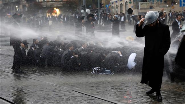 Photo of Occupation police use skunk-water cannon to tackle ultra-Orthodox protesters