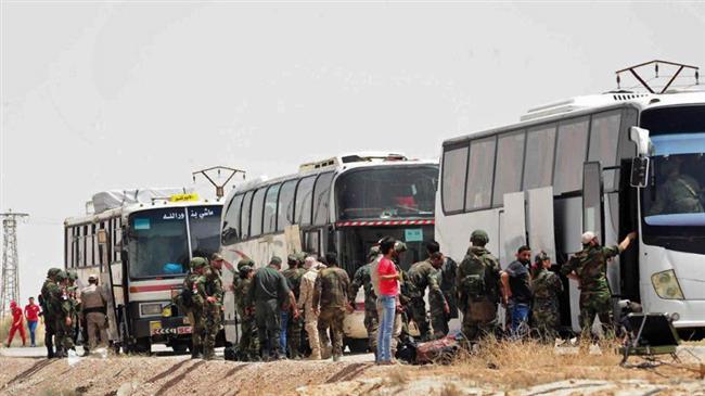 Photo of Takfiri Jaish al-Islam terrorists return Qalamoun town to Syrian government