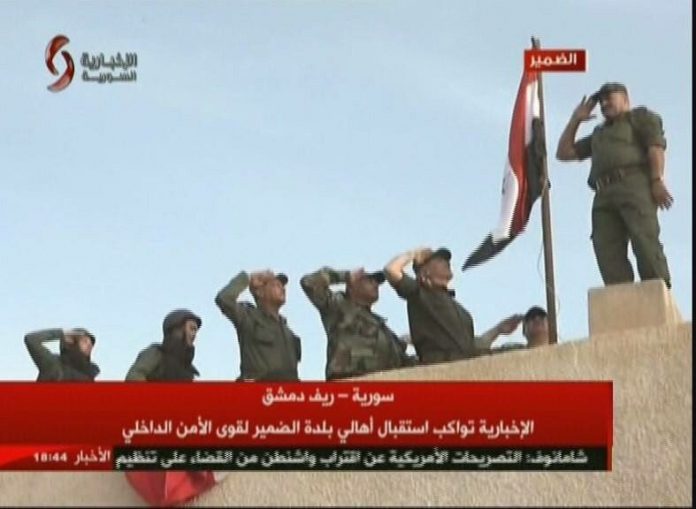Photo of Syrian army raises flag of Syria over Dumayr