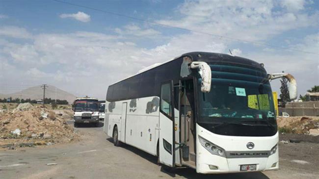 Photo of Terrorists, prisoners begin to evacuate Douma as part of deal with Damascus
