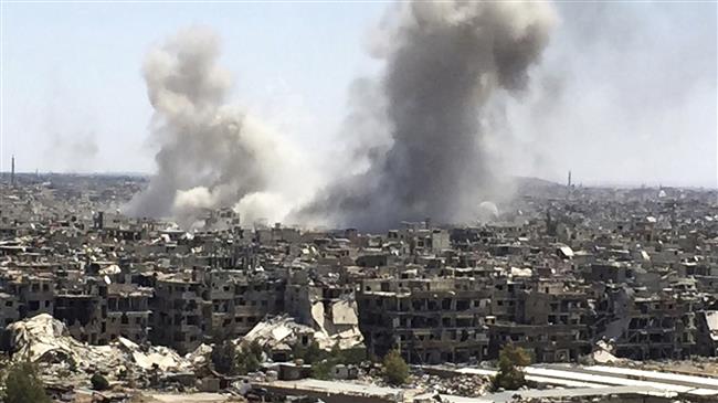 Photo of Syrian forces gain ground in militant-held Damascus district