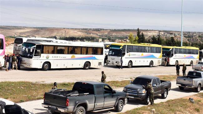 Photo of Terrorists leave Syrian towns south of Damascus under government deal