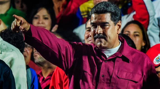 Photo of Maduro re-elected Venezuelan president; rival candidate challenges results