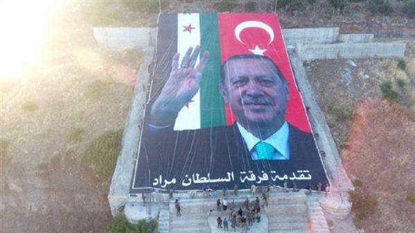 Photo of Inhuman FSA celebrates Erdogan’s victory by raising banner over former YPG stronghold