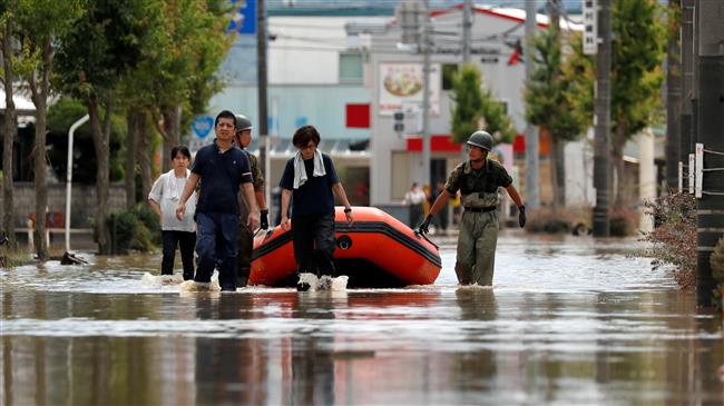 Photo of Japan in ‘race against time’ to rescue flood victims