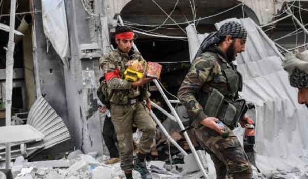 Photo of Turkey-Backed Militants Continue Plundering Civilians’ Assets in Northern Syria