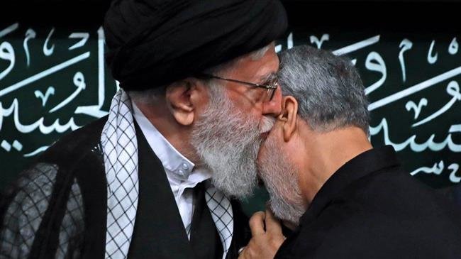Photo of Leader of the Islamic Ummah and Oppressed Imam Sayyed Ali Khamenei awards General Soleimani with Iran’s highest military order