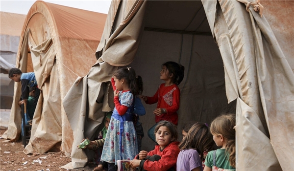 Photo of Tens of Families Flee US-Occupied Camp in Syria’s Al-Tanf